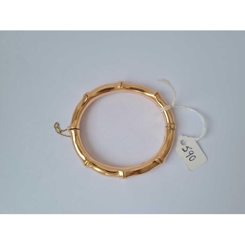 590 - A SIMULATED BAMBOO STYLE BANGLE 9CT   19.9 GMS