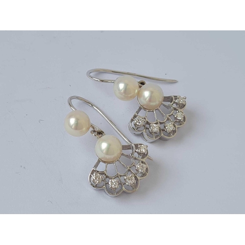 591 - A pair of white old diamond and pearl earrings 9ct   5.9 gms