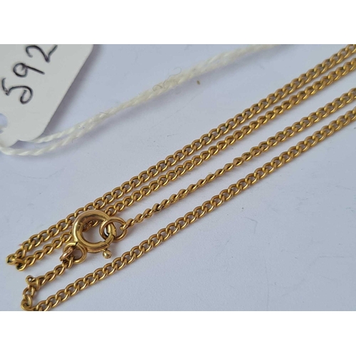 592 - A long curb link neck chain 9ct 22 inch   4 gms