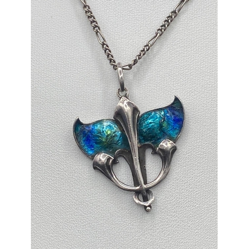 257 - A art nouveau silver and enamel pendant and chain