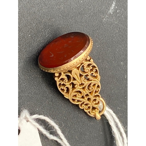 57 - A 19th century high carat gold eastern seal carnelian intaglio of flowers