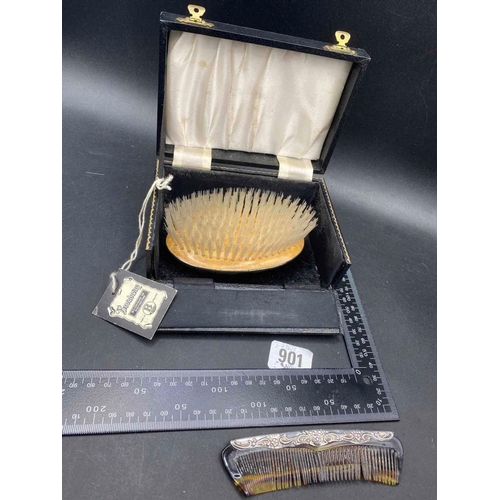 901 - A boxed hairbrush and comb