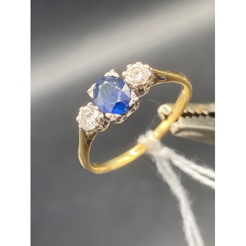 119 - A SAPPHIRE AND DIAMOND THREE STONE RING 18CT GOLD