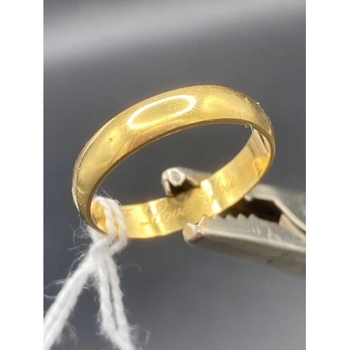 142 - plain 18ct gold wedding band with �I love you� on inside size O 3.3g