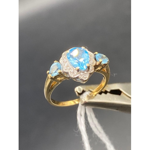 143 - A gold and blue tear shaped topaz diamond dress ring size J 2.6g inc