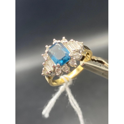 144 - A blue and white stone costume ring