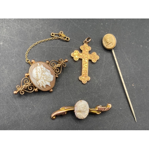 227 - An antique 9ct cross, 2 gold cameo brooches and a cameo stick pin