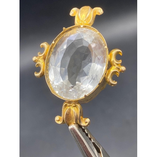 469 - A large antique white quartz faceted stone in fancy yellow metal mount