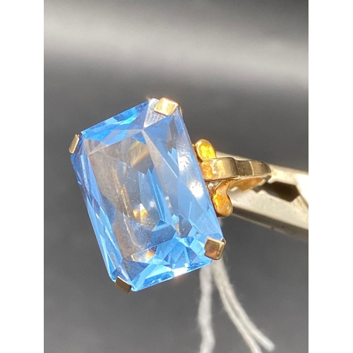 5 - A very large rectangular blue stone dress ring in 9ct setting size M 10.3g inc