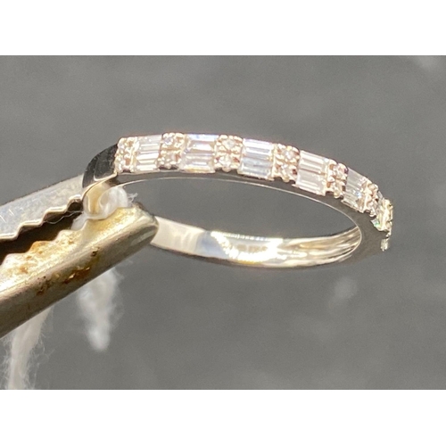 129 - A WHITE GOLD BAGUETTE AND ROUND DIAMOND HALF ETERNITY RING 14CT GOLD SIZE N   2.1 GMS