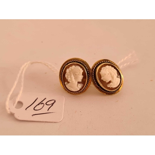 169 - Pair of gold mounted cameo earrings 4.4g inc