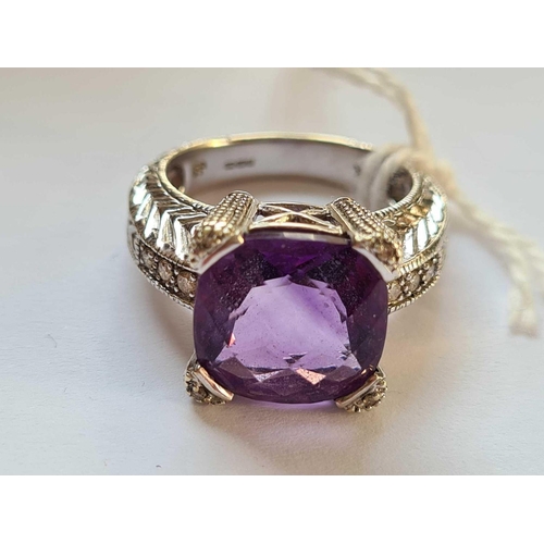 206 - A IMPRESSIVE WHITE GOLD RING WITH LARGE FACETED AMETHYST 1CM DIAMETER WITH 6 DIAMONDS TO SHOULDER AN... 