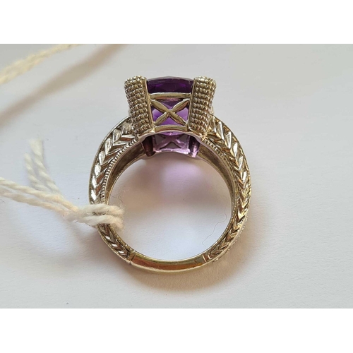 206 - A IMPRESSIVE WHITE GOLD RING WITH LARGE FACETED AMETHYST 1CM DIAMETER WITH 6 DIAMONDS TO SHOULDER AN... 