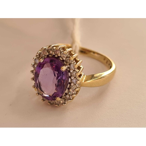 207 - A nice amethyst and diamond cluster ring with large central amethyst 10mm X 8mm  9ct size L     4.2 ... 