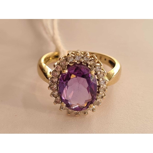 207 - A nice amethyst and diamond cluster ring with large central amethyst 10mm X 8mm  9ct size L     4.2 ... 