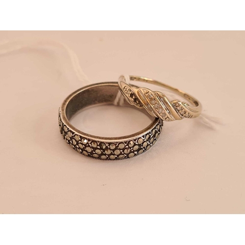 365 - A white gold diamond dress ring and a silver & marcasite ring