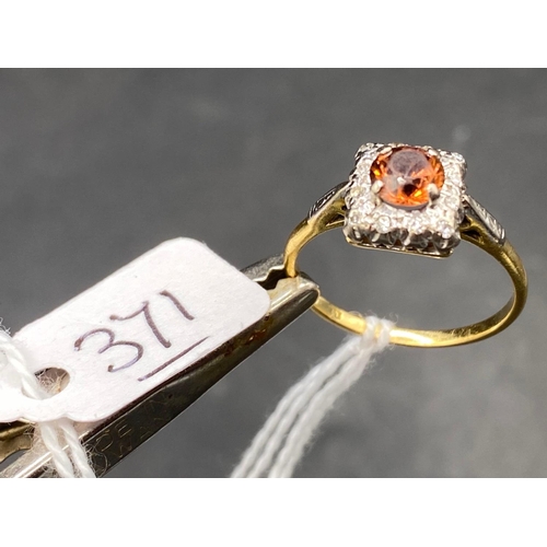 371 - A good quality diamond and pale orange stone set 18ct gold dress ring size Q 3.5g