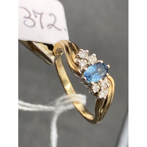 372 - A blue stone and diamond 9ct dress ring size U 3.7g inc