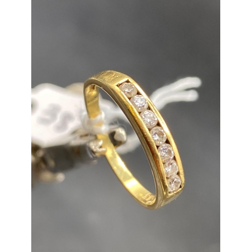 38 - A seven stone diamond ring 18ct gold size P    2.8 gms