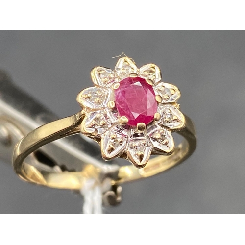 461 - Ruby & diamond flower head ring in 9ct size Q 2.6g inc