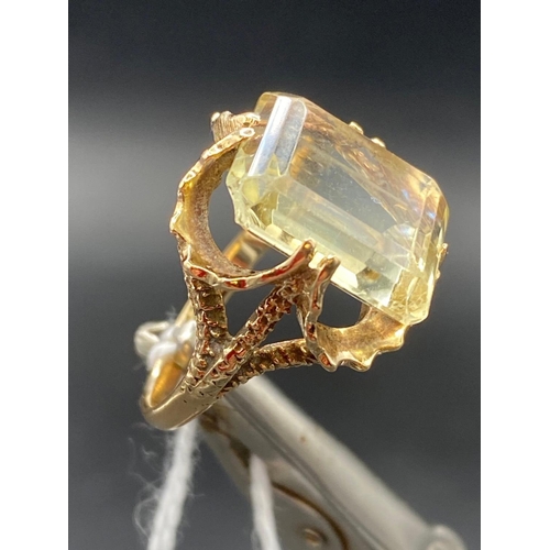 604 - A citrine dress ring in 9ct mount size J 5.2g inc