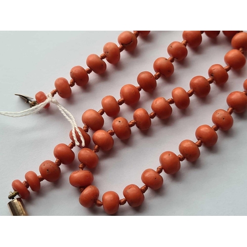 332 - A ANTIQUE STRING OF LARGE CORAL BEADS