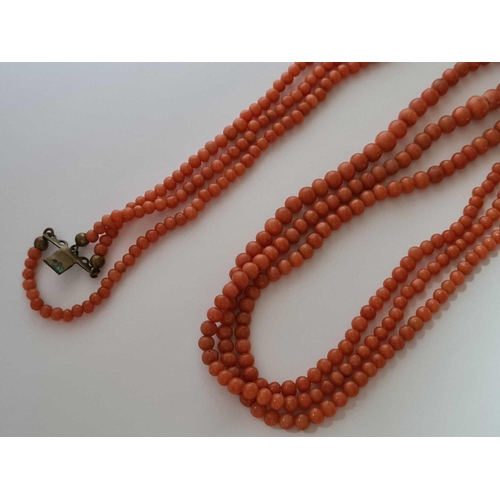 58 - A Victorian coral bead three strand necklace with original clasp