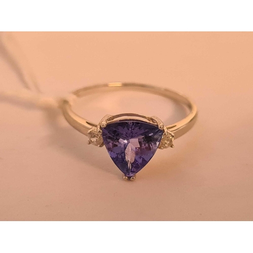 67 - An unusual shaped Tanzanite & diamond 9ct white gold ring size L �