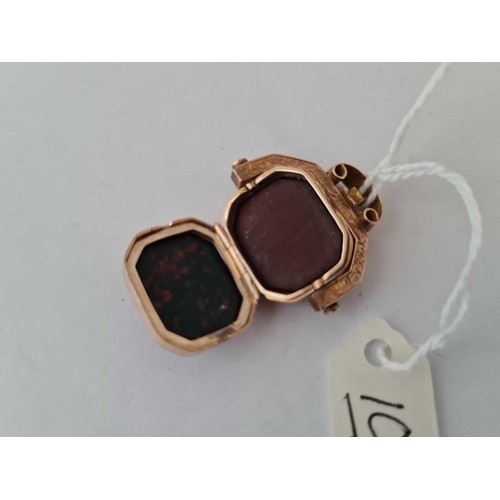 10 - An unusual antique gold locket swivel seal agate set