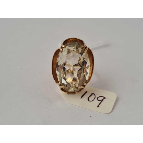 109 - A large attractive pale smokey quartz oval stone ring set in fancy gold mount 9ct gold size K   6.6 ... 