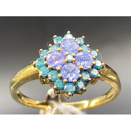 139 - A Tanzanite & Zircon cluster dress ring 9ct