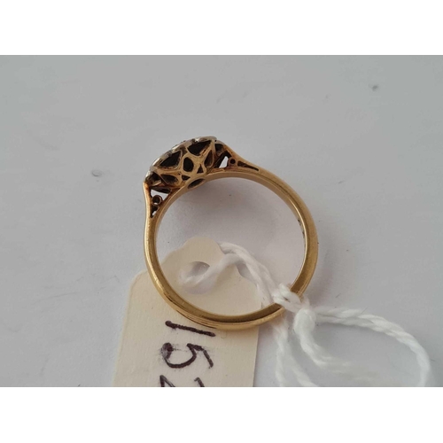 152 - A diamond flower head ring 18ct gold size L   3.4 gms