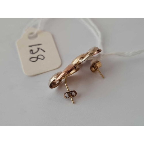 158 - A pair of three colour gold ear studs 9ct