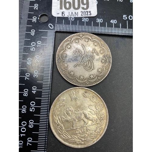 1609 - Two Large Middle Eastern Silver Coins.