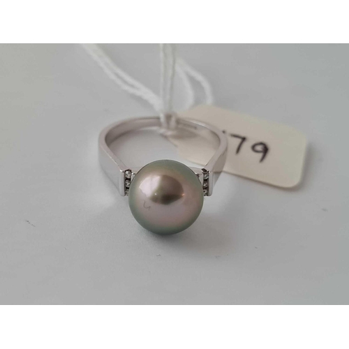 179 - A white gold Tahitian pearl and diamond ring 9ct size O