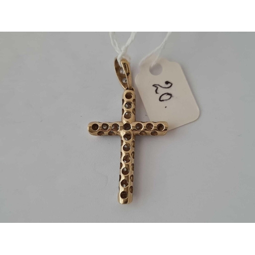 20 - A diamond cross 9ct    3.6 gms