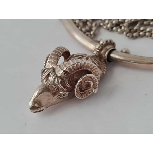 210 - A silver rams head  pendant necklace