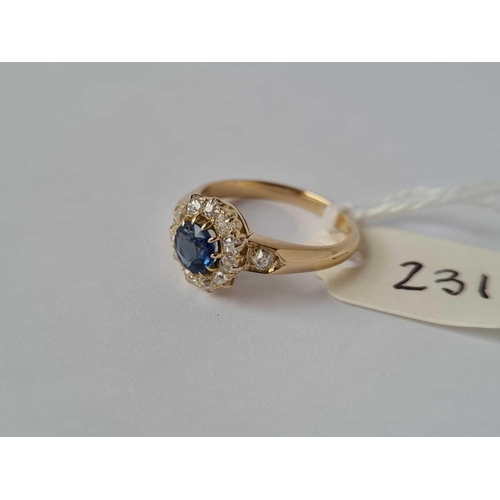 231 - A VICTORIAN SAPPHIRE AND DIAMOND CLUSTER RING WITH DIAMOND SHOULDERS 18CT GOLD SIZE K