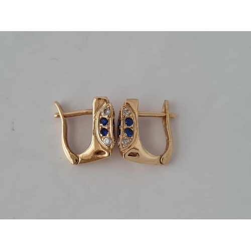 261 - A pair of sapphire 14ct gold earrings 3.5g