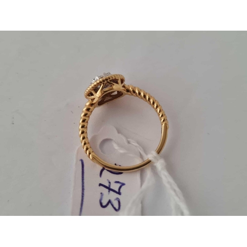 273 - An attractive diamond ring with rope twist detail to shank in 18ct gold size M 3.5g inc