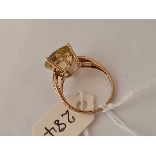 284 - A heart shape ring with diamond shoulders set in gold size O