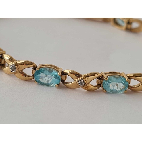 305 - A diamond and blue Apatite 9ct bracelet 10.1g