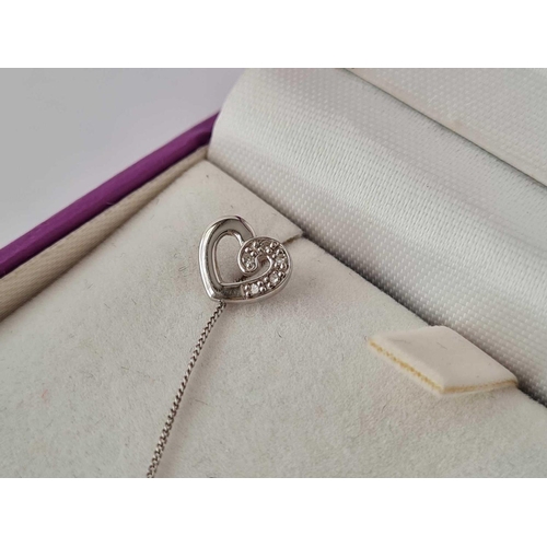 309 - Diamond heart and earrings in 9ct white gold boxed