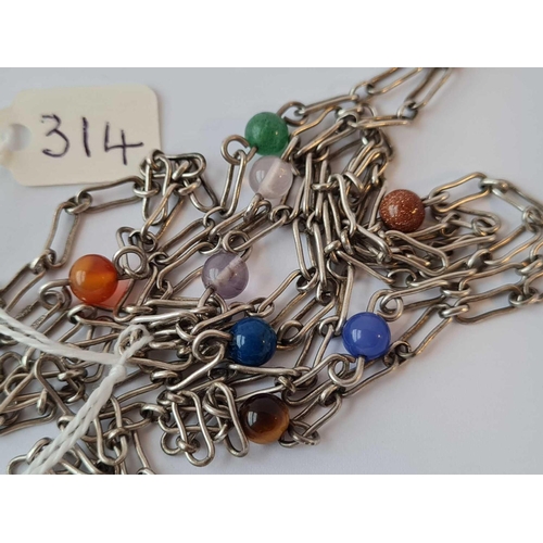 314 - A silver fancy link opera length necklace interspersed with semi precious beads 48 inches