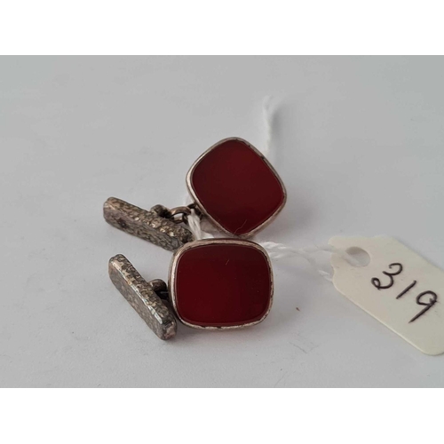 319 - A pair of silver and carnelian cufflinks by GH