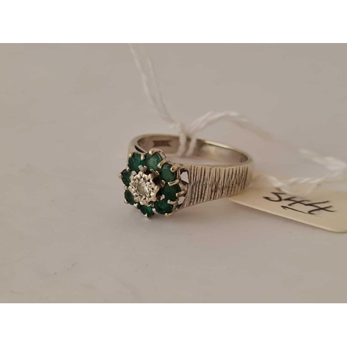 344 - A modernist emerald & diamond 9ct white gold ring size M 4g