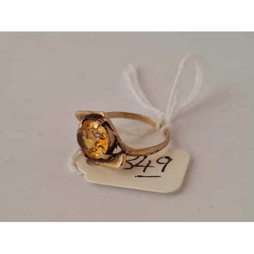 349 - A yellow stone 9ct ring size I 2.5g inc