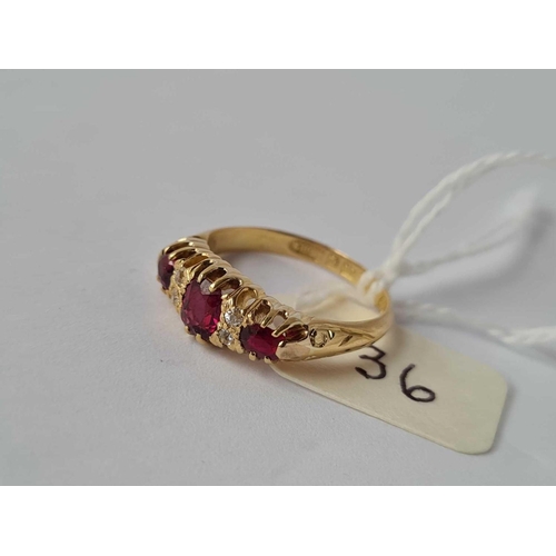 36 - A EDWARDIAN GOLD RUBY AND DIAMOND SEVEN STONE RING CHESTER 1907 18CT GOLD SIZE L