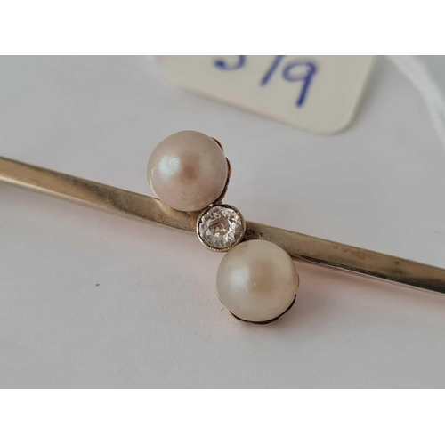 379 - A pearl and diamond bar brooch set in gold   3.2 gms