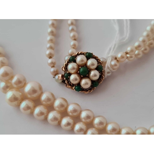 381 - A 9ct mounted two row pearl necklace